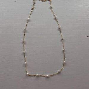 Elegant Gold and White Pearl Necklace